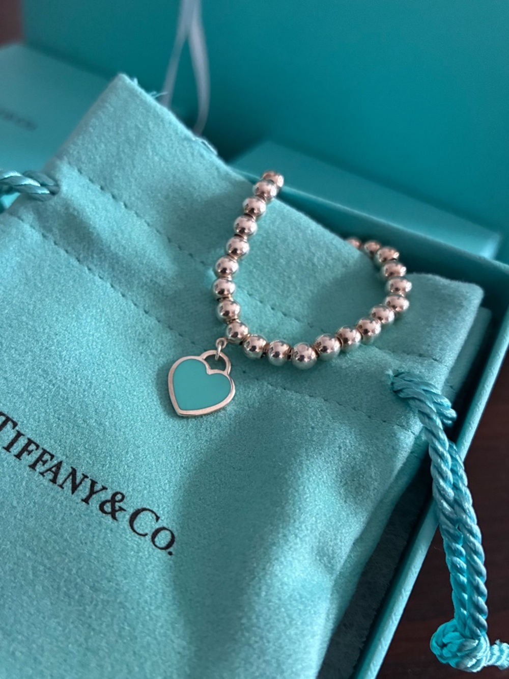 Tiffany & Co. Silver Beaded Ring with Tiffany Blue Heart Charm